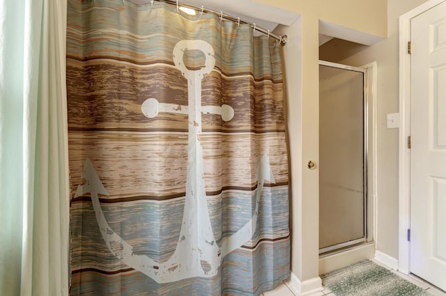 175 Templar Ave, Pinckney, MI 48169 - bathroom with a shower with curtain, baseboards, and tile patterned flooring