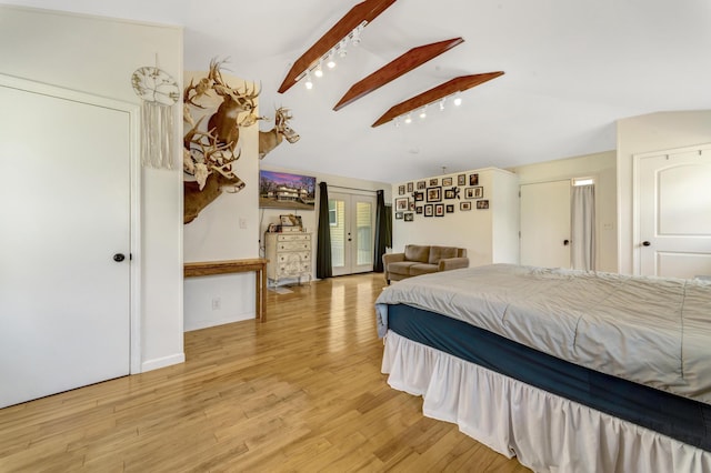 175 Templar Ave, Pinckney, MI 48169 - bedroom with light wood finished floors, french doors, and access to exterior