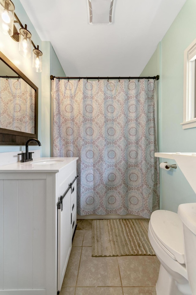 175 Templar Ave, Pinckney, MI 48169 - full bath featuring vanity, toilet, and tile patterned floors