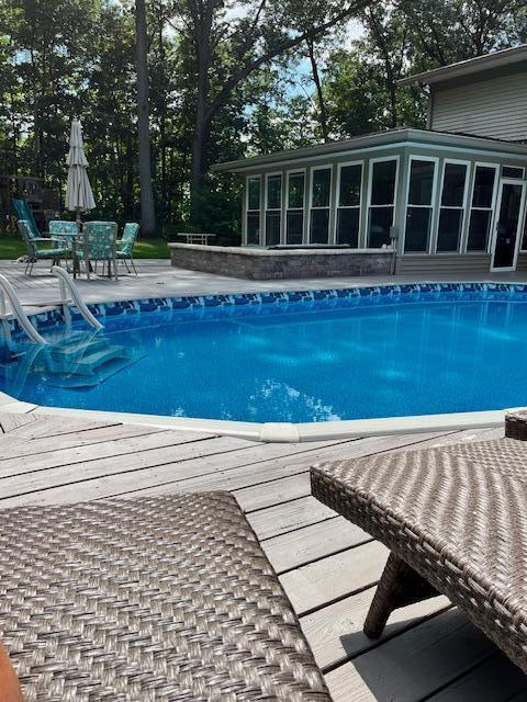 175 Templar Ave, Pinckney, MI 48169 - outdoor pool featuring a deck