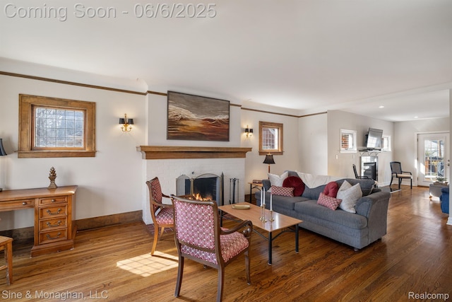 797 Washington Rd, Grosse Pointe, MI 48230 - living room featuring a fireplace, wood finished floors, baseboards, and recessed lighting