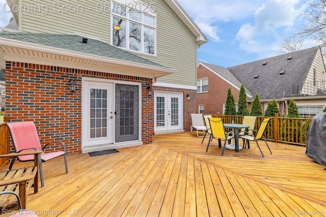 797 Washington Rd, Grosse Pointe, MI 48230 - wooden deck with french doors and outdoor dining space