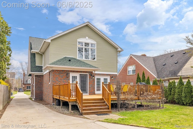 797 Washington Rd, Grosse Pointe, MI 48230 - back of property with a deck, brick siding, and a shingled roof