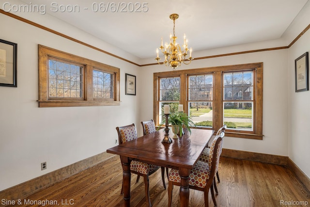 797 Washington Rd, Grosse Pointe, MI 48230 - dining room featuring a chandelier, baseboards, healthy amount of natural light, and wood finished floors