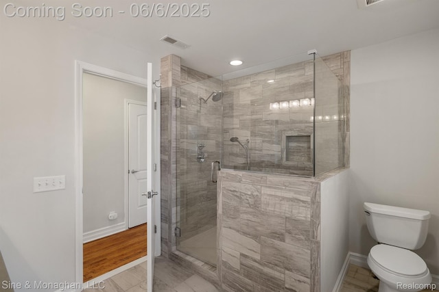797 Washington Rd, Grosse Pointe, MI 48230 - bathroom featuring a shower stall, baseboards, toilet, and recessed lighting