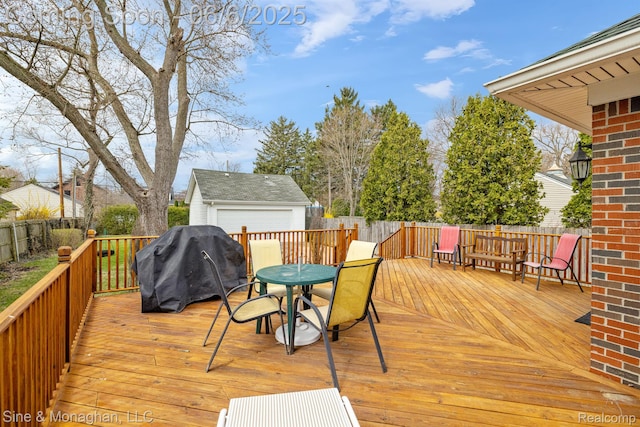 797 Washington Rd, Grosse Pointe, MI 48230 - deck featuring outdoor dining area, an outdoor structure, and grilling area