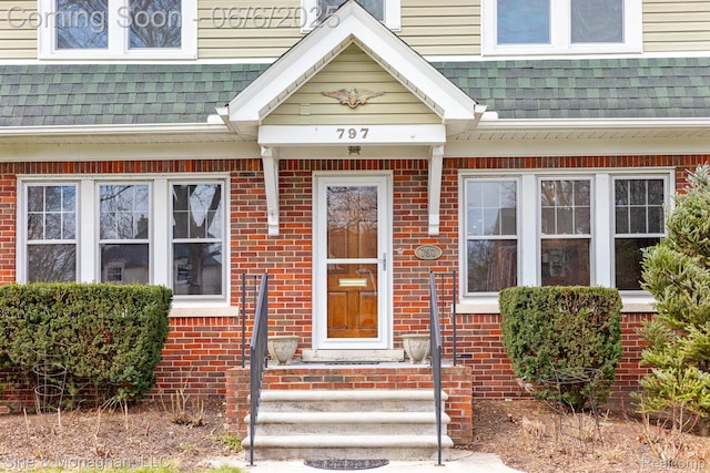 797 Washington Rd, Grosse Pointe, MI 48230 - property entrance with roof with shingles and brick siding