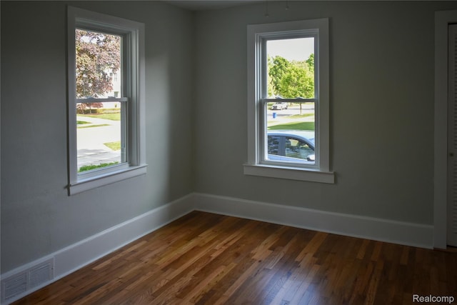 3434 Durham Rd, Clawson, MI 48073 - spare room featuring baseboards and dark wood-type flooring