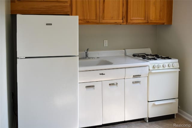 3434 Durham Rd, Clawson, MI 48073 - kitchen featuring white appliances, a sink, light countertops, baseboards, and brown cabinets