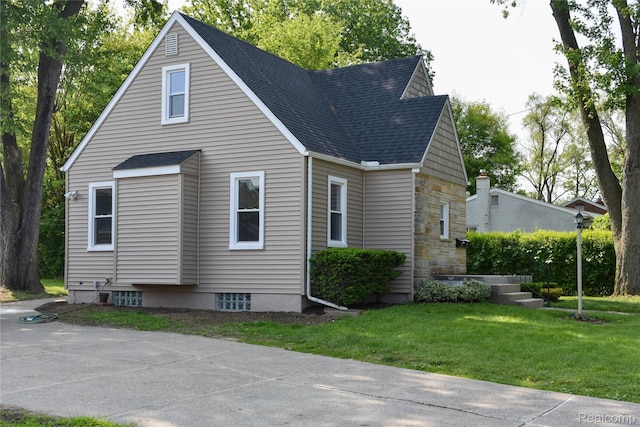 3434 Durham Rd, Clawson, MI 48073 - view of side of home featuring roof with shingles, a lawn, and stone siding