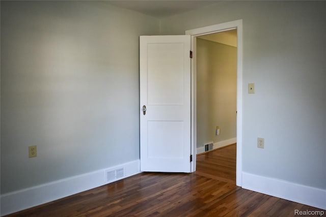 3434 Durham Rd, Clawson, MI 48073 - empty room with dark wood-type flooring and baseboards