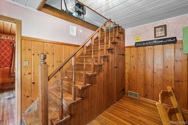 1250 W Thompson Rd, Fenton, MI 48430 - staircase with wood finished floors and wood walls