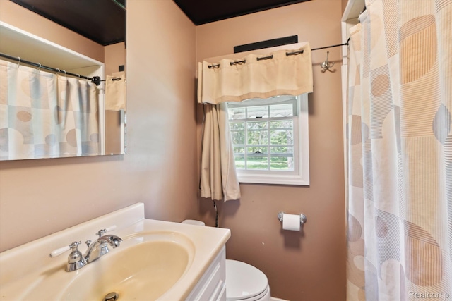 1250 W Thompson Rd, Fenton, MI 48430 - bathroom featuring toilet, vanity, and a shower with curtain