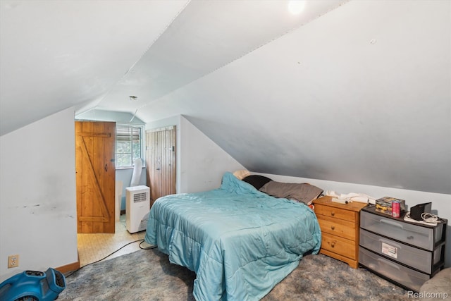 1250 W Thompson Rd, Fenton, MI 48430 - bedroom with lofted ceiling and carpet floors
