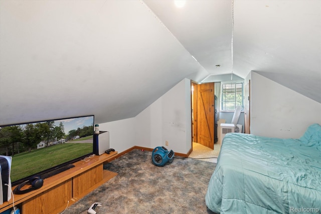 1250 W Thompson Rd, Fenton, MI 48430 - carpeted bedroom featuring vaulted ceiling and baseboards