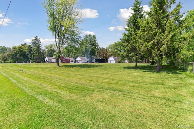 1250 W Thompson Rd, Fenton, MI 48430 - view of yard featuring view of scattered trees