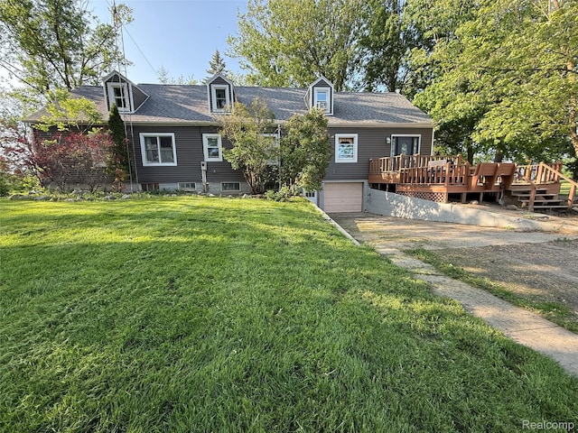 4131 Wellman Line Rd, Brown City, MI 48416 - back of house with a garage, a deck, a lawn, and driveway