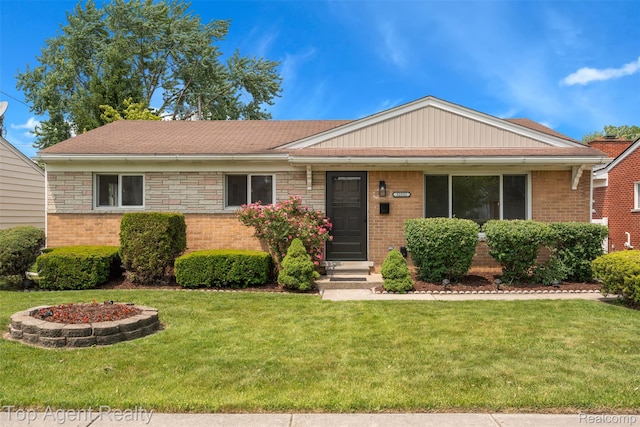 32532 Steinhauer St, Westland, MI 48186 - ranch-style house featuring a front lawn and brick siding