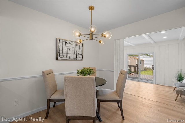 32532 Steinhauer St, Westland, MI 48186 - dining area with beam ceiling, wood finished floors, and a chandelier