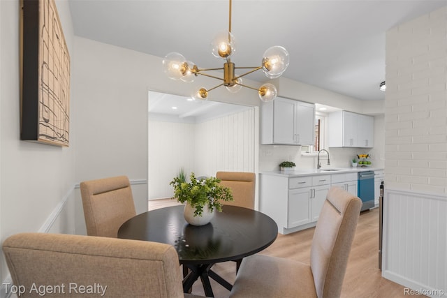 32532 Steinhauer St, Westland, MI 48186 - dining area with light wood-type flooring and a chandelier