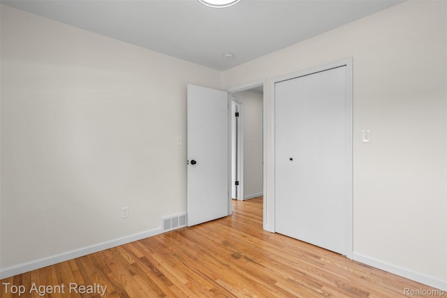 32532 Steinhauer St, Westland, MI 48186 - unfurnished bedroom with light wood-type flooring, baseboards, and a closet