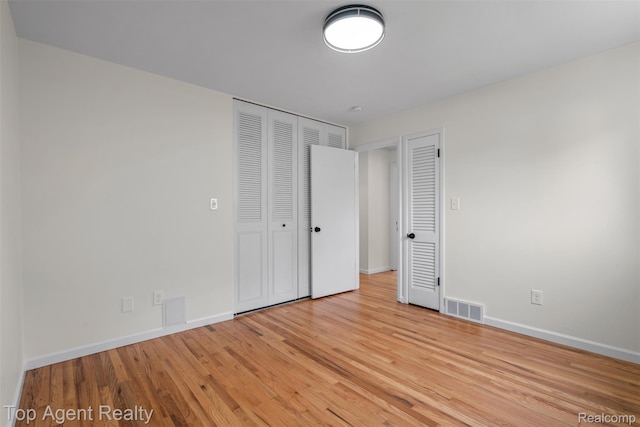 32532 Steinhauer St, Westland, MI 48186 - unfurnished bedroom with light wood-style flooring, baseboards, and a closet
