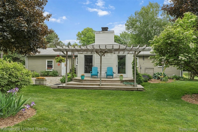 3875 Zimmer Rd, Williamston, MI 48895 - rear view of property featuring a pergola, a deck, a yard, and a chimney
