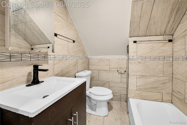 3851 Fredro St, Hamtramck, MI 48212 - bathroom with tile walls, a tub, vanity, and toilet