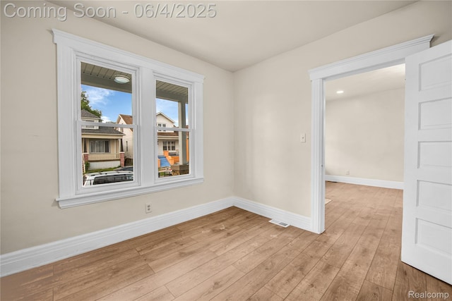 3851 Fredro St, Hamtramck, MI 48212 - unfurnished room with baseboards and light wood-style flooring
