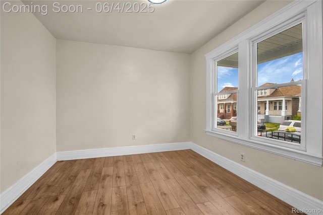 3851 Fredro St, Hamtramck, MI 48212 - spare room featuring baseboards and wood finished floors