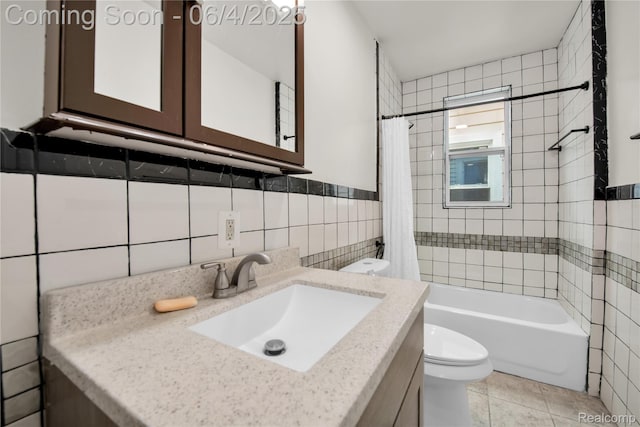 3851 Fredro St, Hamtramck, MI 48212 - full bathroom with tile walls, toilet, vanity, shower / bath combo, and tile patterned floors
