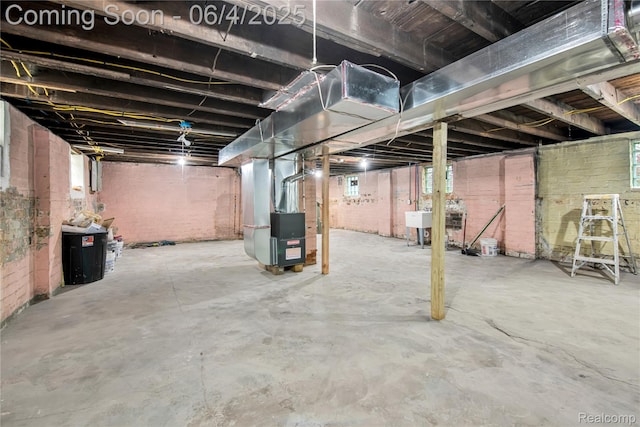 3851 Fredro St, Hamtramck, MI 48212 - basement featuring heating unit and a sink