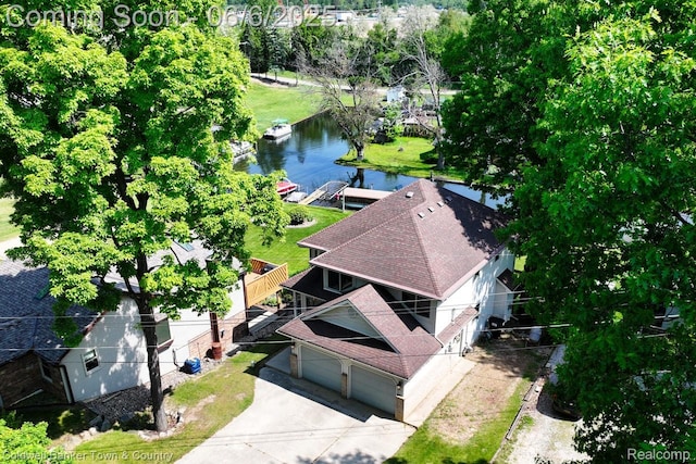11265 N Shore Dr, Whitmore Lake, MI 48189 - view from above of property featuring a nearby body of water and a tree filled landscape