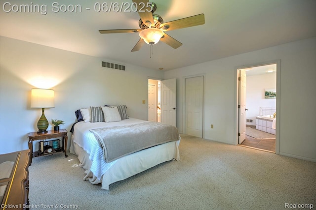 11265 N Shore Dr, Whitmore Lake, MI 48189 - carpeted bedroom with connected bathroom and ceiling fan