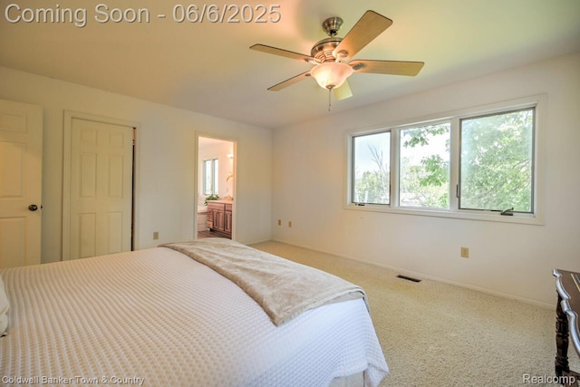 11265 N Shore Dr, Whitmore Lake, MI 48189 - bedroom featuring carpet floors, baseboards, ensuite bath, and a ceiling fan