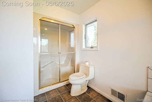 11265 N Shore Dr, Whitmore Lake, MI 48189 - full bath featuring toilet, a stall shower, baseboards, and tile patterned flooring