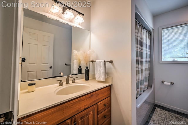 11265 N Shore Dr, Whitmore Lake, MI 48189 - bathroom with vanity, baseboards, and shower / tub combo