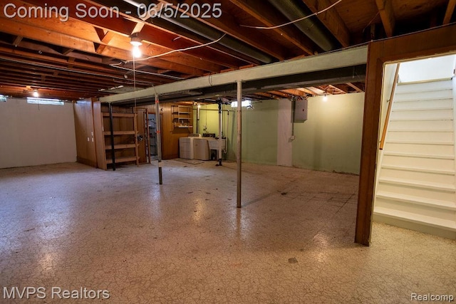 33316 Fraser Ave, Fraser, MI 48026 - unfinished below grade area with washing machine and dryer, electric panel, and a sink
