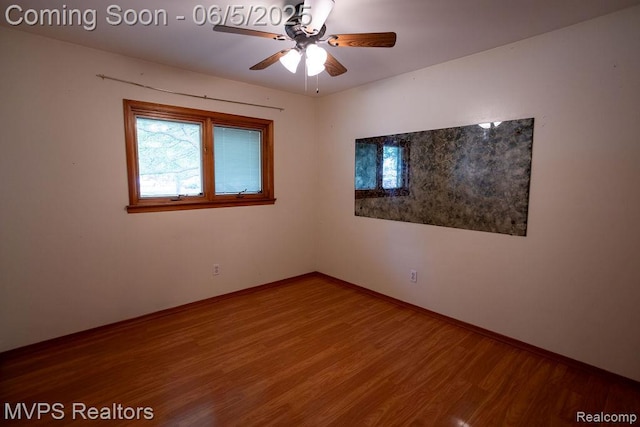 33316 Fraser Ave, Fraser, MI 48026 - spare room with wood finished floors, baseboards, and a ceiling fan