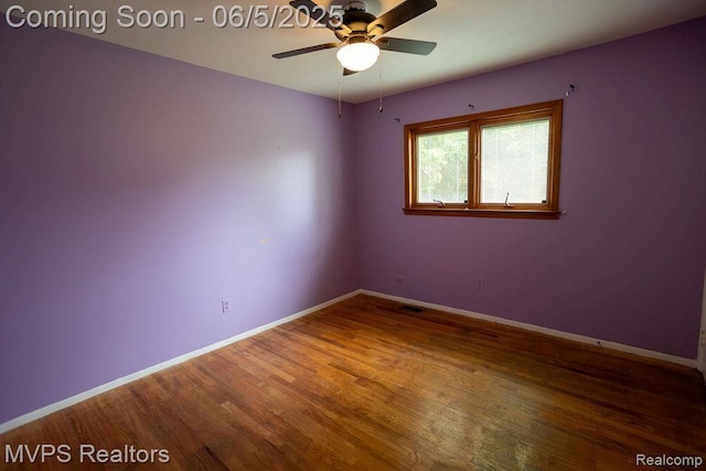33316 Fraser Ave, Fraser, MI 48026 - unfurnished room featuring a ceiling fan, wood finished floors, and baseboards