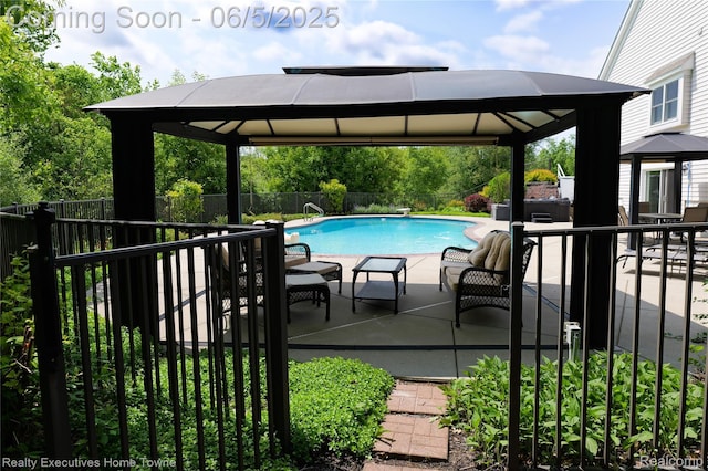 13999 French Ln, Davisburg, MI 48350 - view of pool with a gazebo, a fenced backyard, and a patio