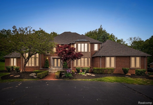 4932 Susans Way, Bloomfield Hills, MI 48302 - view of front of house featuring brick siding, french doors, and a shingled roof