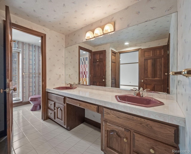 4932 Susans Way, Bloomfield Hills, MI 48302 - bathroom featuring double vanity, toilet, wallpapered walls, and tile patterned flooring