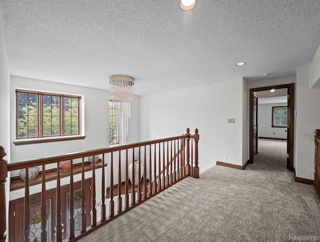 4932 Susans Way, Bloomfield Hills, MI 48302 - corridor featuring carpet flooring, a textured ceiling, an upstairs landing, recessed lighting, and baseboards
