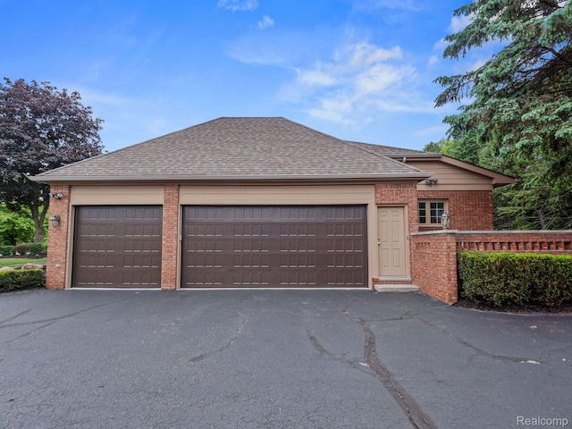 4932 Susans Way, Bloomfield Hills, MI 48302 - view of front of property with brick siding, a shingled roof, driveway, and a garage