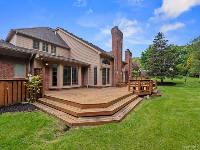 4932 Susans Way, Bloomfield Hills, MI 48302 - back of property featuring a lawn, brick siding, and a deck