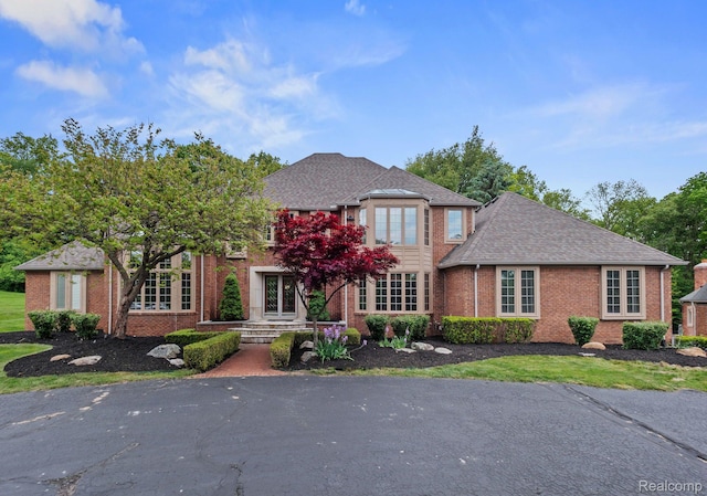4932 Susans Way, Bloomfield Hills, MI 48302 - view of front facade featuring brick siding and french doors