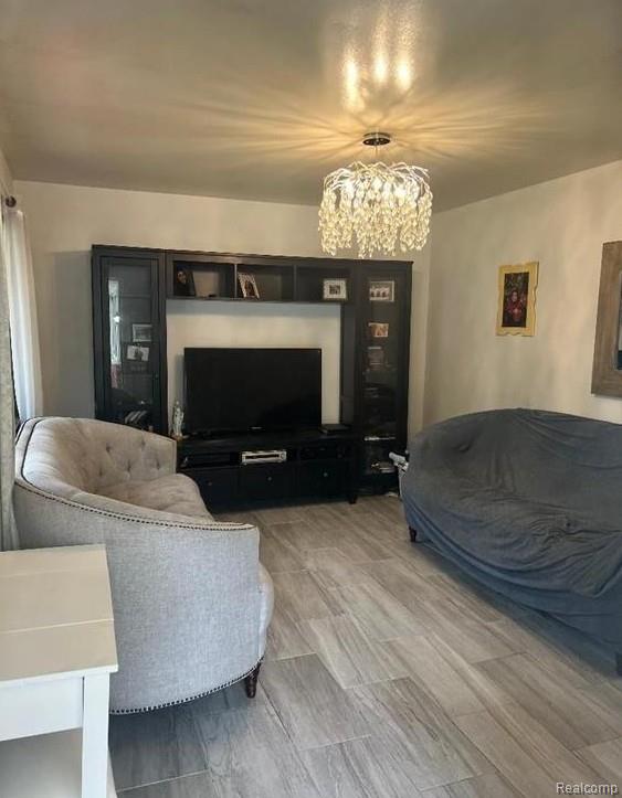 41541 Mcbride Ave, Van Buren, MI 48111 - living area featuring a chandelier