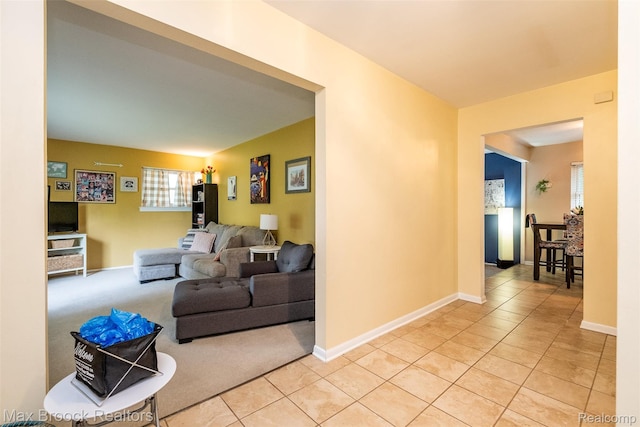 2655 Aspen Ln, Bloomfield Hills, MI 48302 - living area with light tile patterned floors, light carpet, and baseboards