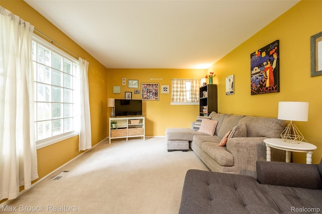2655 Aspen Ln, Bloomfield Hills, MI 48302 - living area with healthy amount of natural light, carpet floors, and baseboards